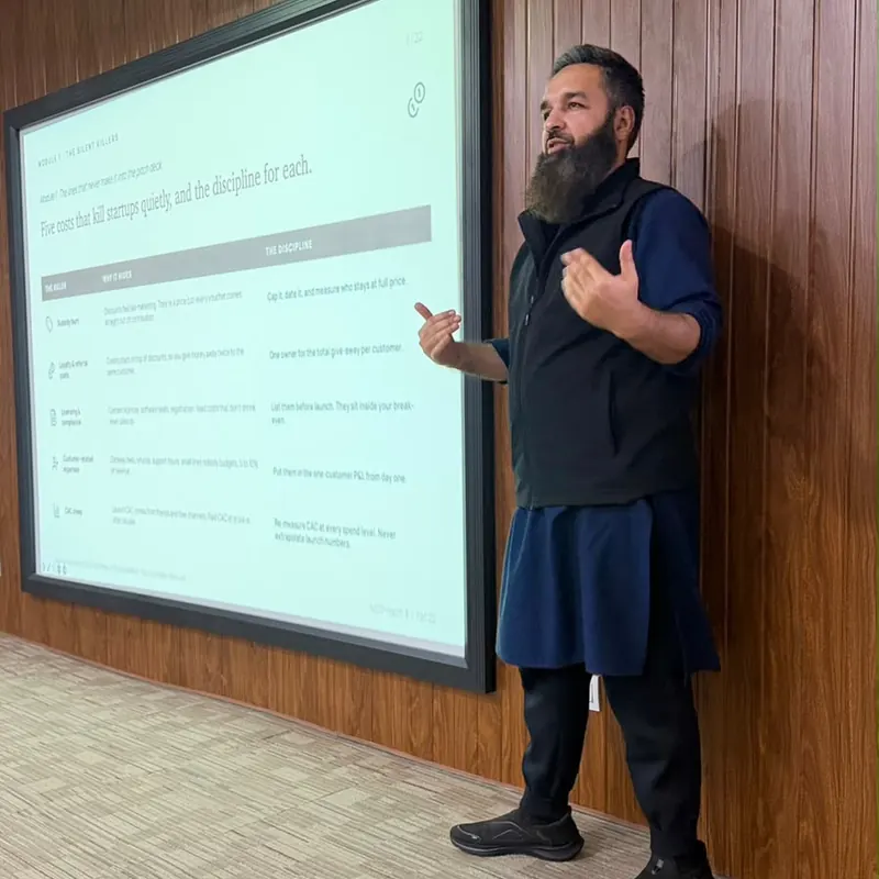 Umar Muhammad Sharif teaching an AI workshop